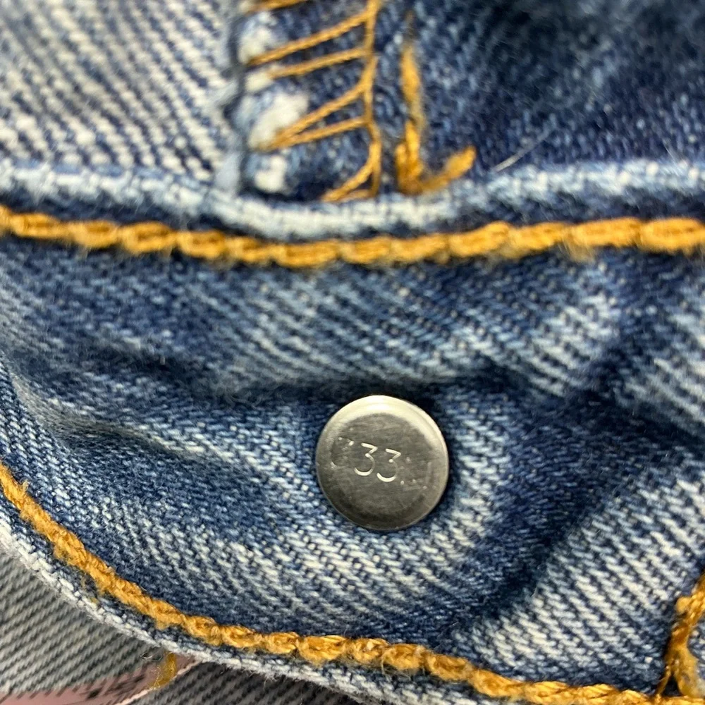 Vintage Levi’s 501XX button fly straight leg 90s medium wash jeans 34 x 29